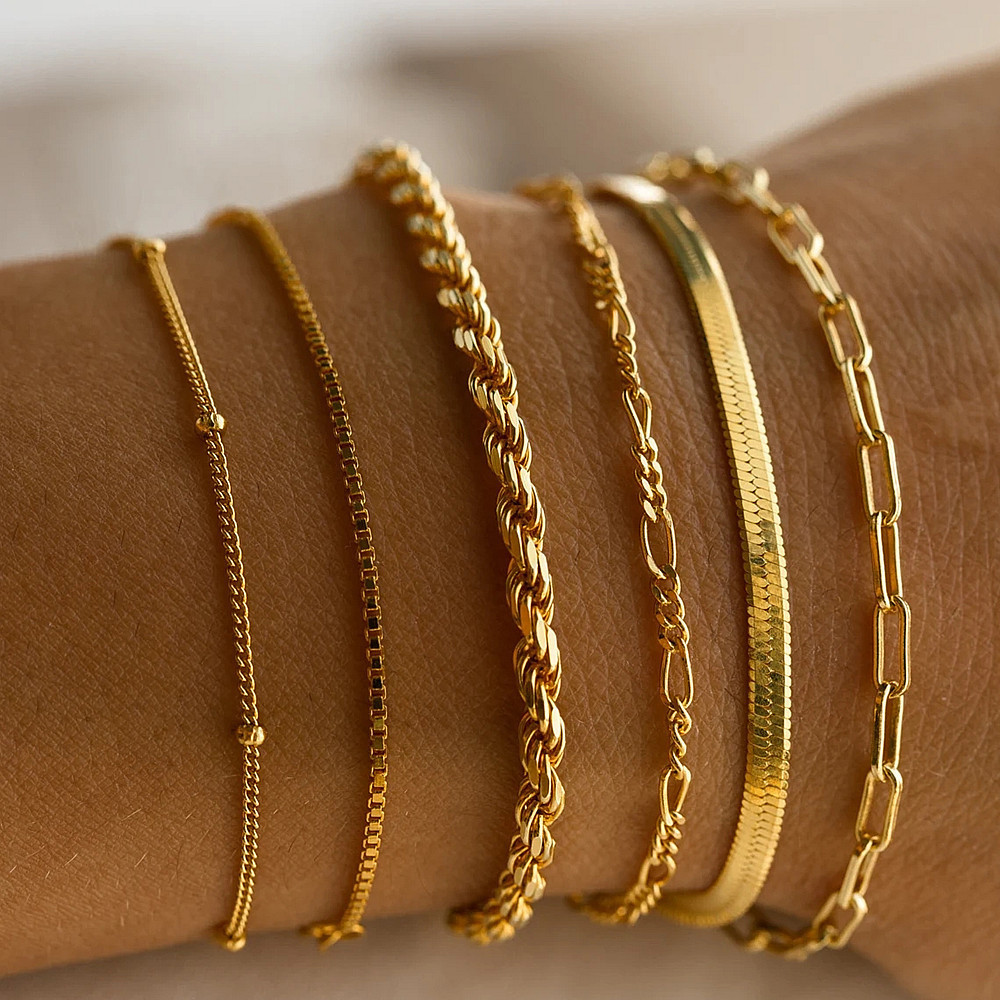 A golden six-piece set Chic Multi-Layered Alloy Bracelet Set - Fashionable — image 1