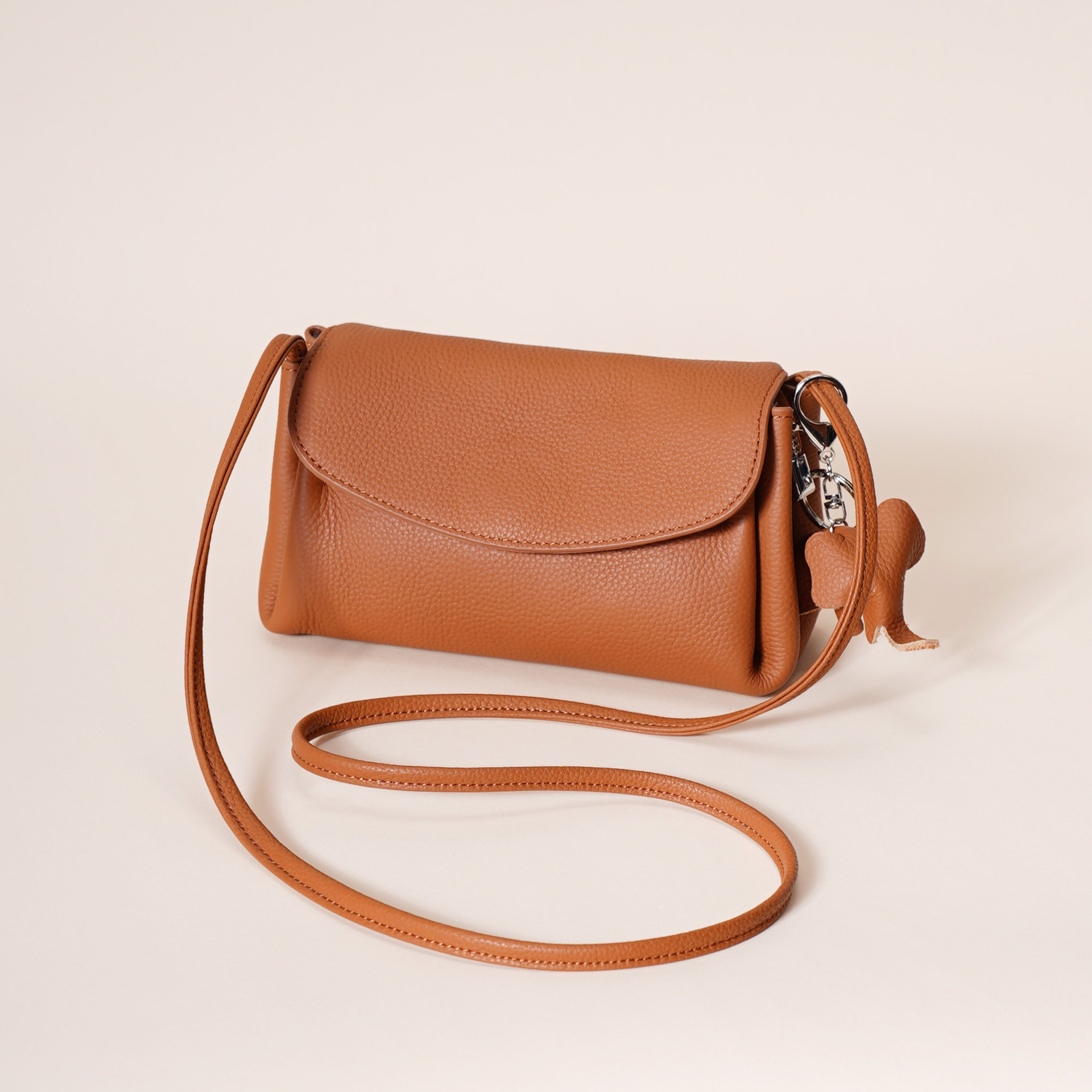 Genuine Leather Flap Crossbody Bag with Elephant Charm - Compact & Stylish view 2
