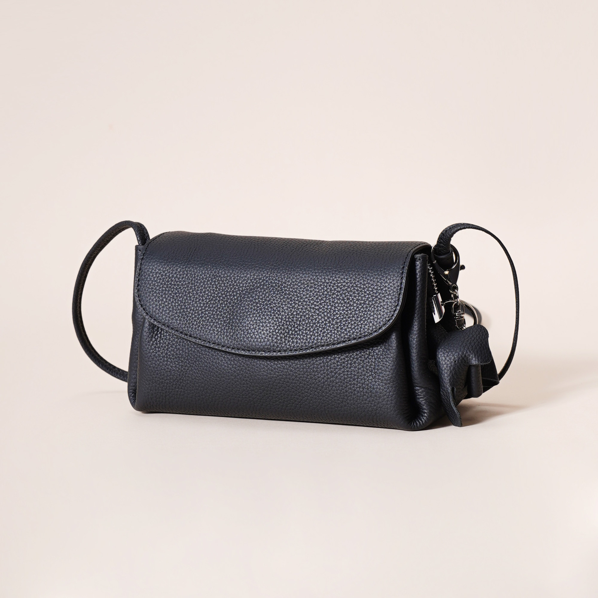 Genuine Leather Flap Crossbody Bag with Elephant Charm - Compact & Stylish — image 1