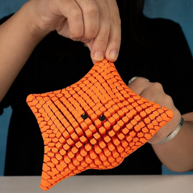 Pink 3D-Printed Articulated Starfish Fidget Toy for Stress Relief view 2