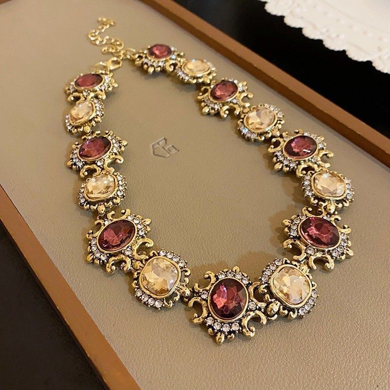 Gold Necklace with Purple Stone