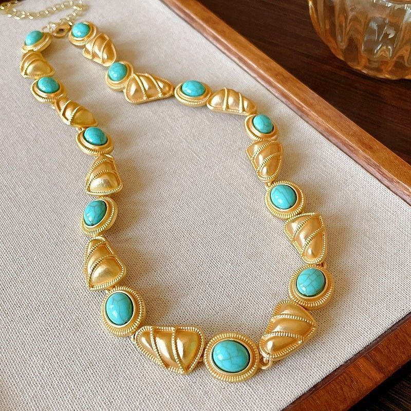 Gold Necklace with Blue Stone