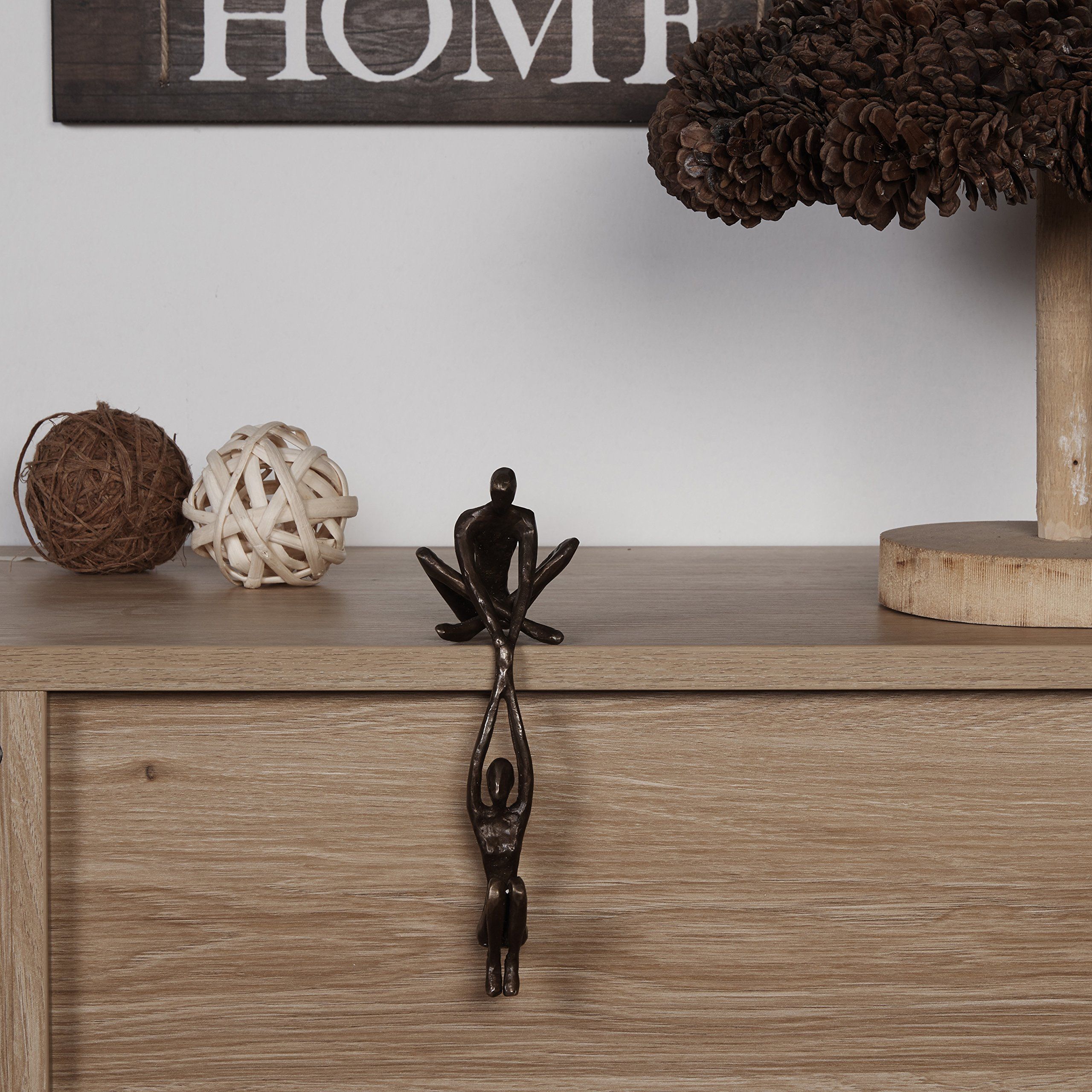 Contemporary Metal Shelf Décor - Bronze Sculpture - Man Lifting Woman from view 3