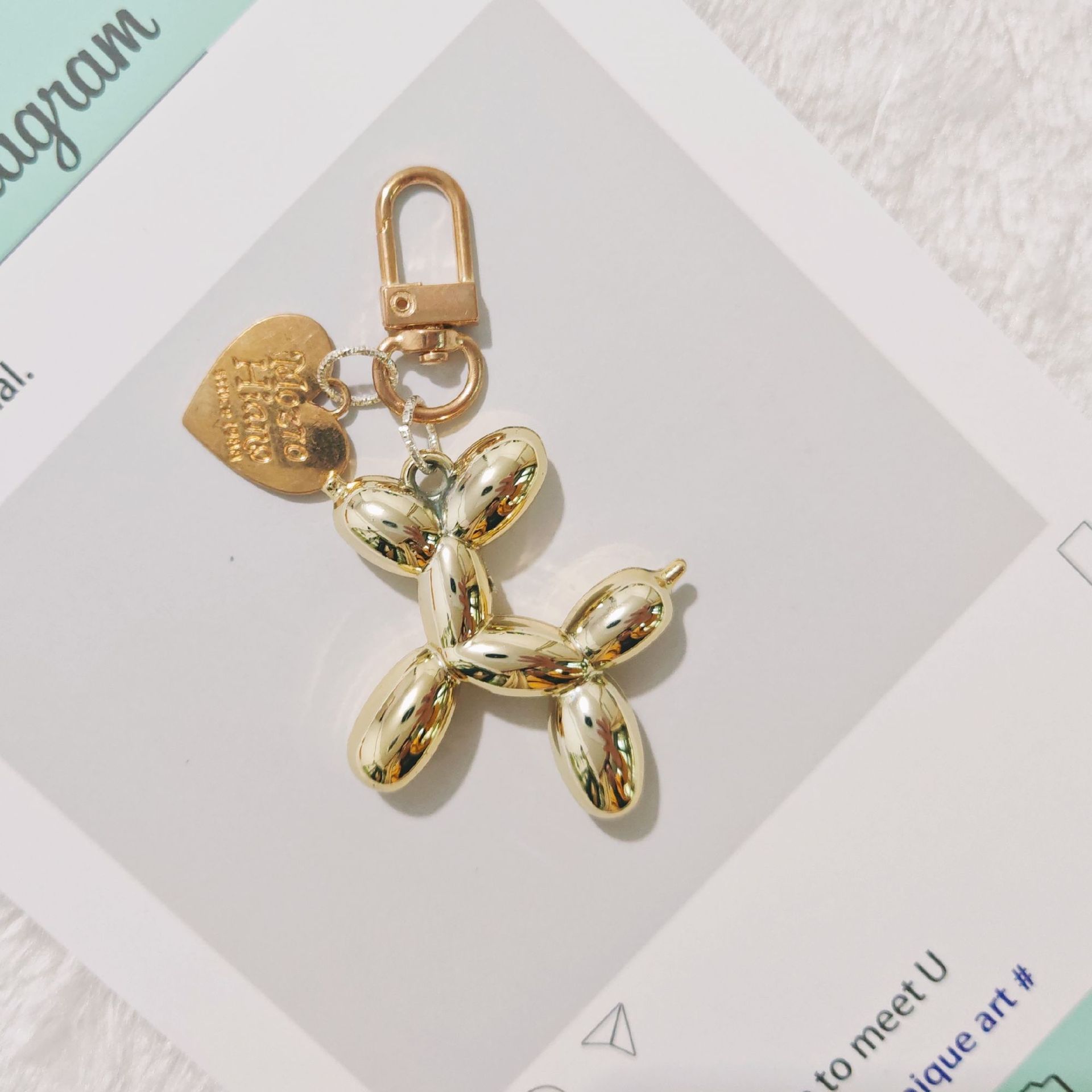 2-Piece Golden Balloon Dog Keychain Set with Heart Charm Bag Pendant Cute