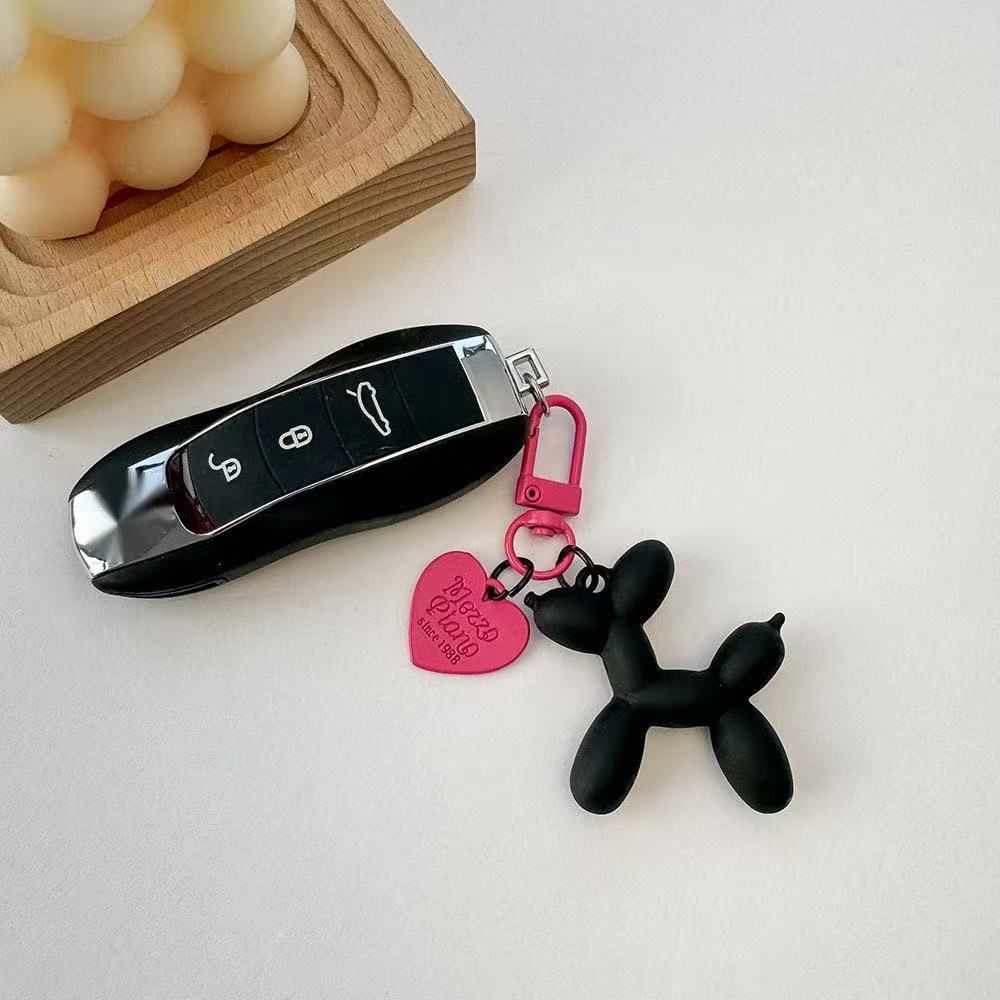 2-Piece Black Balloon Dog Keychain Set with Heart Charm Bag Pendant Cute