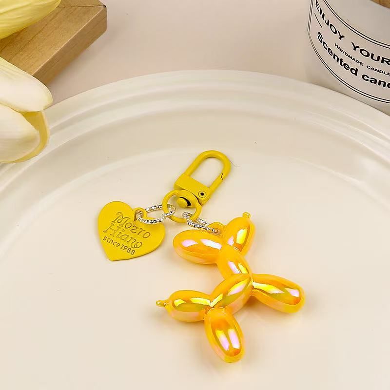 2-Piece Yellow Balloon Dog Keychain Set with Heart Charm Bag Pendant Cute
